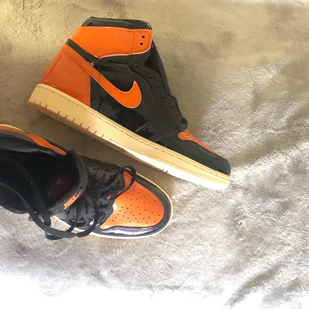 Jordan Air Jordan 1 High OG Black and Orange Patent Leather Sneakers